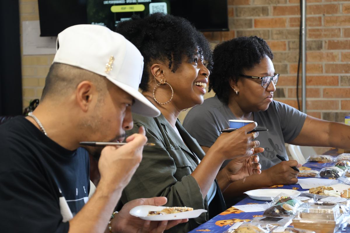 The judges tasting at the baker tables